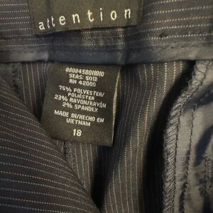Attention penstripe dress pants.